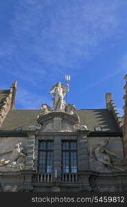 Neptune statue on the house in Gent, Belgium&#xA;