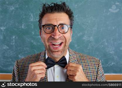 Nerd silly retro teacher man with braces funny expression bow tie portrait