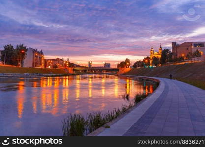 Neris river and church Vilniaus Sv. Arkangelo Rapolo Baznycia, Vilnius at sunset, Lithuania, Baltic states.. Vilnius at sunset, Lithuania, Baltic states.