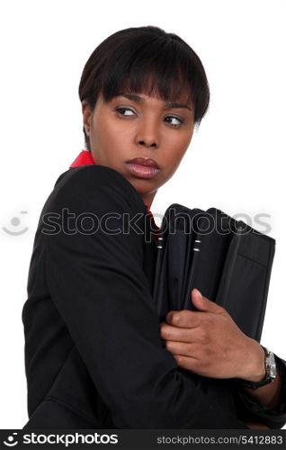 Nervous businesswoman has something to hide
