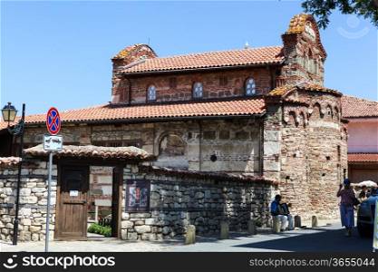 Nesebar, Bulgaria - 06/23/2013: People visit Old Town on June 23, 2013 day of Nessebar, Bulgaria. Nessebar in 1956 was declared as museum city, archaeological and architectural reservation by Unesco.