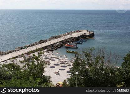 NESEBAR, BULGARIA - AUGUST 29: People visit Old Town on August 29, 2014 in Nesebar, Bulgaria. Nesebar in 1956 was declared as museum city, archaeological and architectural reservation by UNESCO.