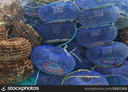 Net cages for catching seafood on the pier in Porto, Portugal