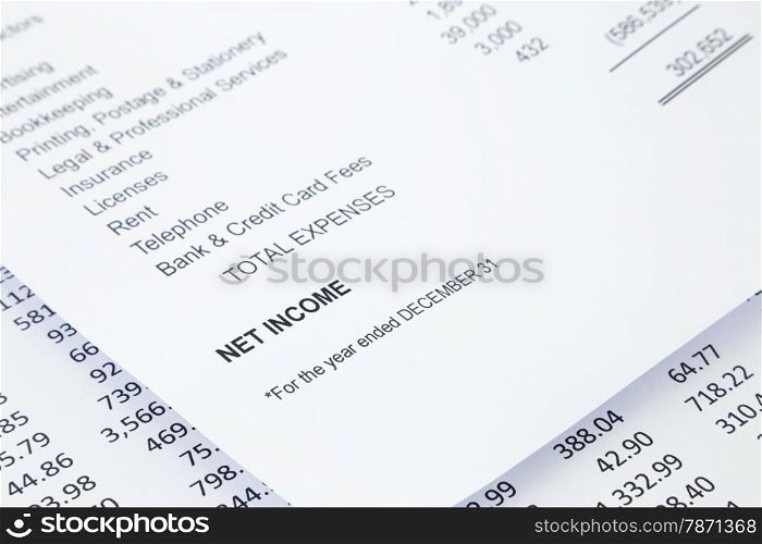 Net income word in business income statement with other detail lists in reports, accounting concept, black and white tone image