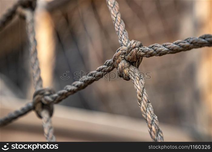 net of rope and close up view of a knot. Selective focus