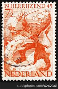 NETHERLANDS - CIRCA 1945: a stamp printed in the Netherlands shows Lion and Dragon, Liberation of Netherlands, Rising Again, circa 1945