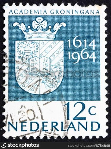 NETHERLANDS - CIRCA 1964: a stamp printed in the Netherlands shows Arms of Groningen University, 350th anniversary of the University of Groningen, circa 1964