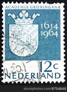 NETHERLANDS - CIRCA 1964: a stamp printed in the Netherlands shows Arms of Groningen University, 350th anniversary of the University of Groningen, circa 1964