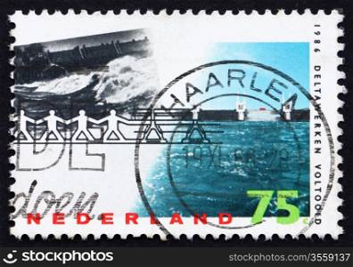NETHERLANDS - CIRCA 1986: a stamp printed in the Netherlands shows Barrier Withstanding Flood, Delta Project Completion, circa 1986