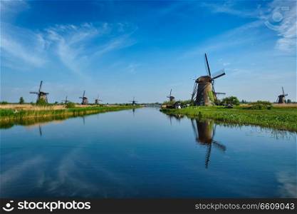 Netherlands rural lanscape with windmills at famous tourist site Kinderdijk in Holland. Windmills at Kinderdijk in Holland. Netherlands