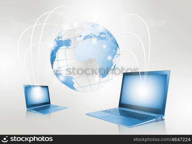 Network concept. Image of laptop with globe illustration at background