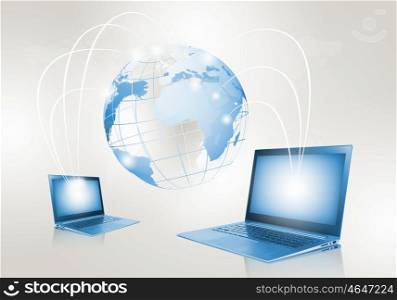 Network concept. Image of laptop with globe illustration at background
