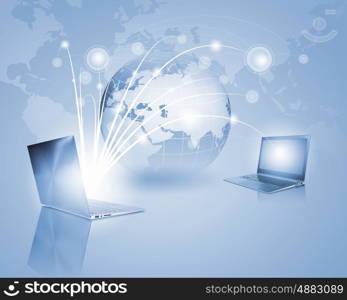 Network concept. Image of laptop with globe illustration at background