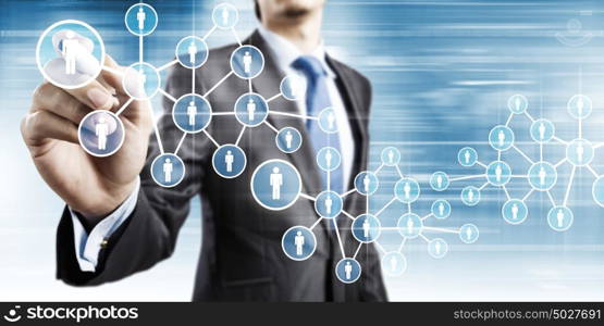 Network marketing. Close up of businessman drawing social net symbols