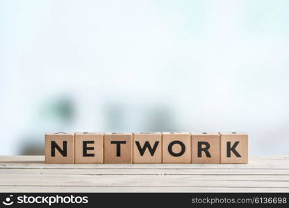 Network sign on a wooden desk in an office