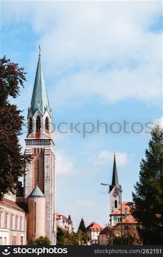 Neuchatel, Switzerland - Old vintage Bell tower of Church of the sacred heart in La Chaux de Fonds, the most important centre of the Swiss watch making industry