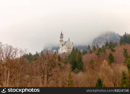 Neuschwanstein Castle fortress In the Bavarian Alps.. The famous German castle Neuschwanstein under dramatic sky. Germany. Bavaria.