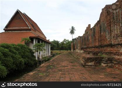 New and old temples in Wat Thummikarat, Ayutthaya, Thailand