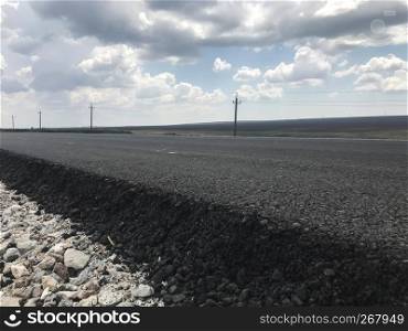 New asfalt on a highway. Side view. Russia