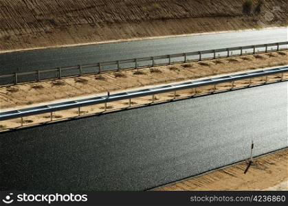 New asphalt highway road. Black asphalt