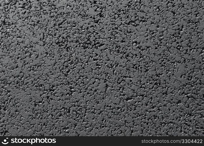 New black asphalt road surface close up abstract texture background.