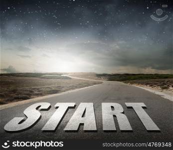 New day new life. Start word as motivation writen on asphalt road