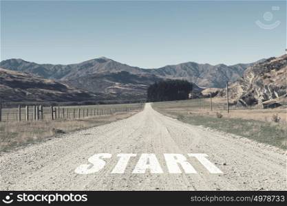 New day new life. Start word as motivation writen on asphalt road