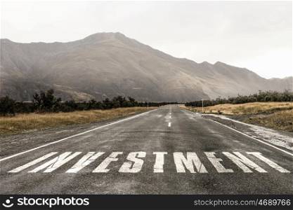 New direction for your business. Asphalt road with business conceptual word drawn with white paint