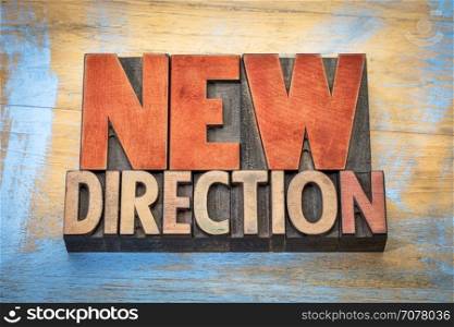 new direction word abstract in vintage letterpress wood type blocks