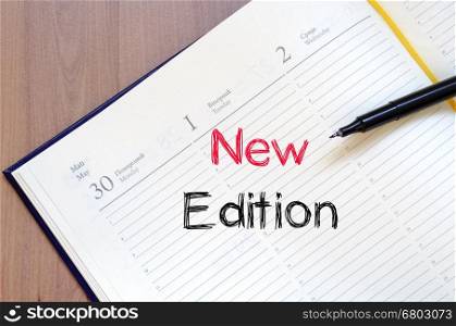 New edition text concept write on notebook