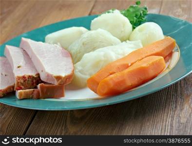New England boiled dinner - basis traditional New England meal, consisting of corned beef with cabbage and vegetable, potato.popular in New England and parts of Atlantic Canada.
