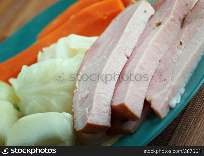 New England boiled dinner - basis traditional New England meal, consisting of corned beef with cabbage and vegetable, potato.popular in New England and parts of Atlantic Canada.