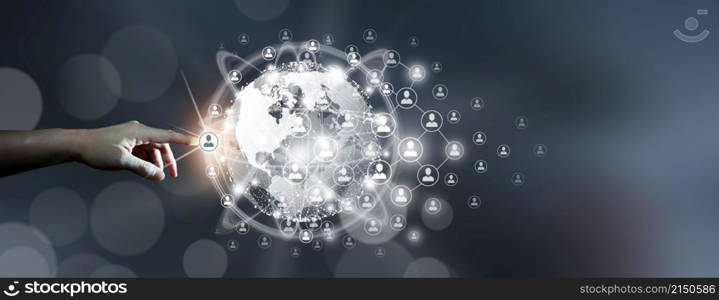 New global business connection concept. Businessman leading the global connection with connecting people orbit around the world. World map and connecting people background. Original source from NASA.