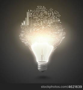 New idea. Conceptual image of electric bulb against grey background