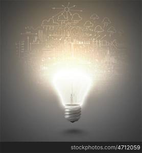 New idea. Conceptual image of electric bulb against grey background