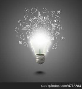 New idea. Conceptual image of electric bulb against grey background