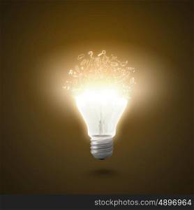 New idea. Conceptual image of electric bulb against yellow background