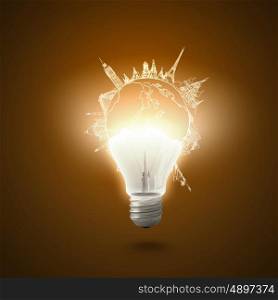 New idea. Conceptual image of electric bulb against yellow background