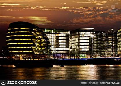 New London city hall at night from Thames river
