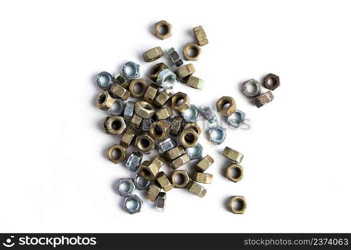 New metal nuts isolated on white background. Tools for construction and repair. New metal nuts isolated on white background. Tools for construction and repair.