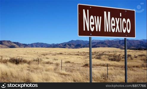 New Mexico road sign with blue sky and wilderness