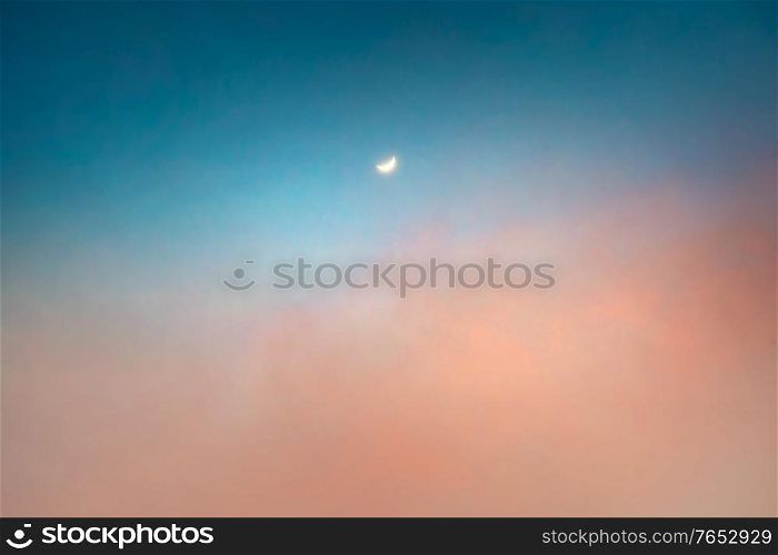 New Moon Over Pastel Colors Sunset Sky Background. Beautiful Skyscape. Tranquil View.