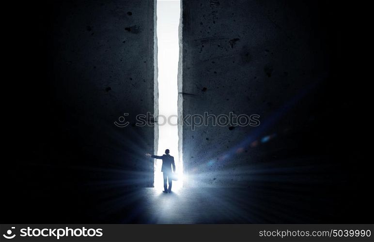 New opportunities. Silhouette of businessman standing in air gap