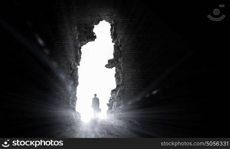 New opportunities. Silhouette of businessman standing in air gap