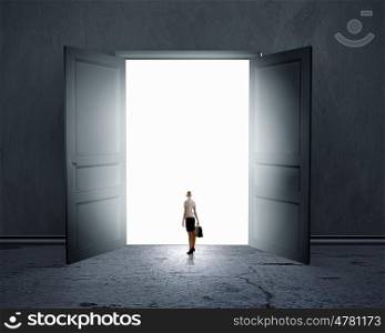 New opportunities. Silhouette of businesswoman standing in air gap