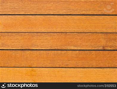 New orange wooden fence texture background with scratches and cracks