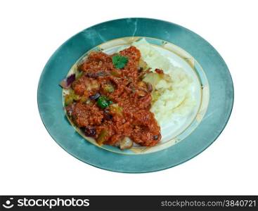 New Orleans Grillades and Grits - medallions of various meats, conventionally beef, veal and pork. breakfast or brunch over grits, they are a traditional Creole food