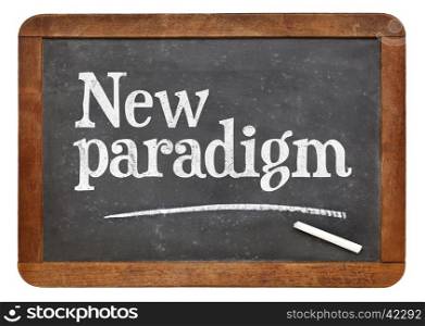 New paradigm - white chalk text on a vintage slate blackboard