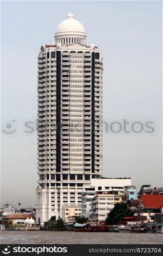 New skyscraper on the bank of Chao Phraya river in Bangkok, Thailand