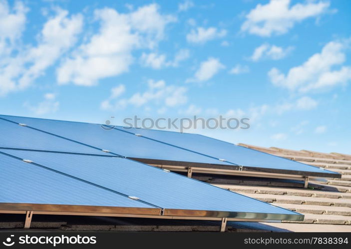 new solar panels on the roof of modern suburban house
